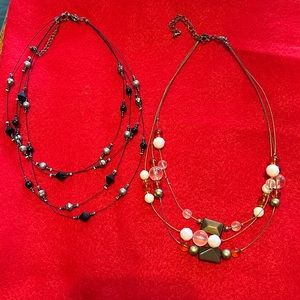Women’s pair of beaded 3 and 4 strands necklaces, 1 gold and 1 black